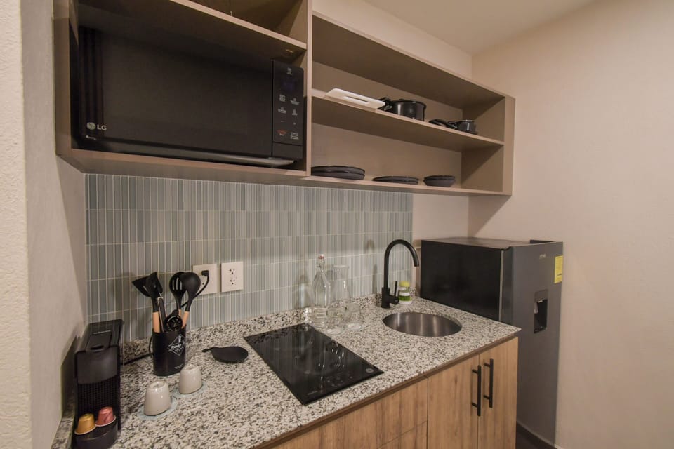 Master Suite with balcony | Private kitchen | Mini-fridge, microwave, espresso maker