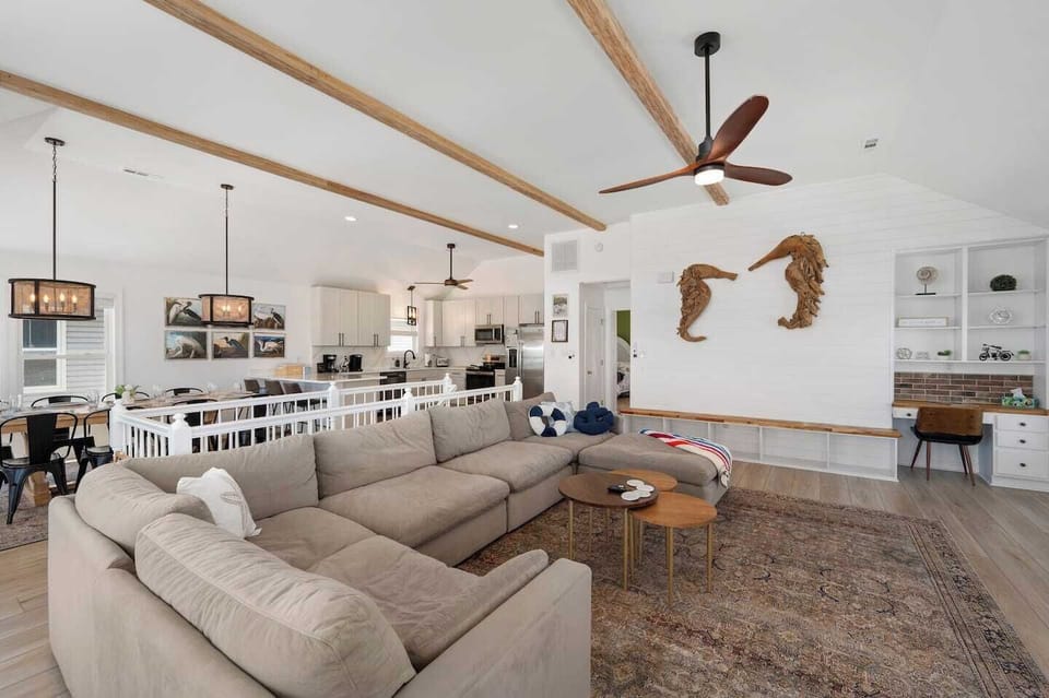️ A cozy living area with a hidden perk—a dedicated workspace in the corner so you can balance work and play with ease.
