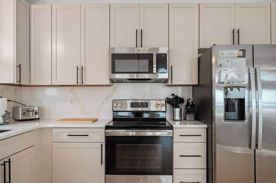 Fully stocked with all the necessities—stainless steel appliances, cookware, and gadgets to make every meal a breeze.
