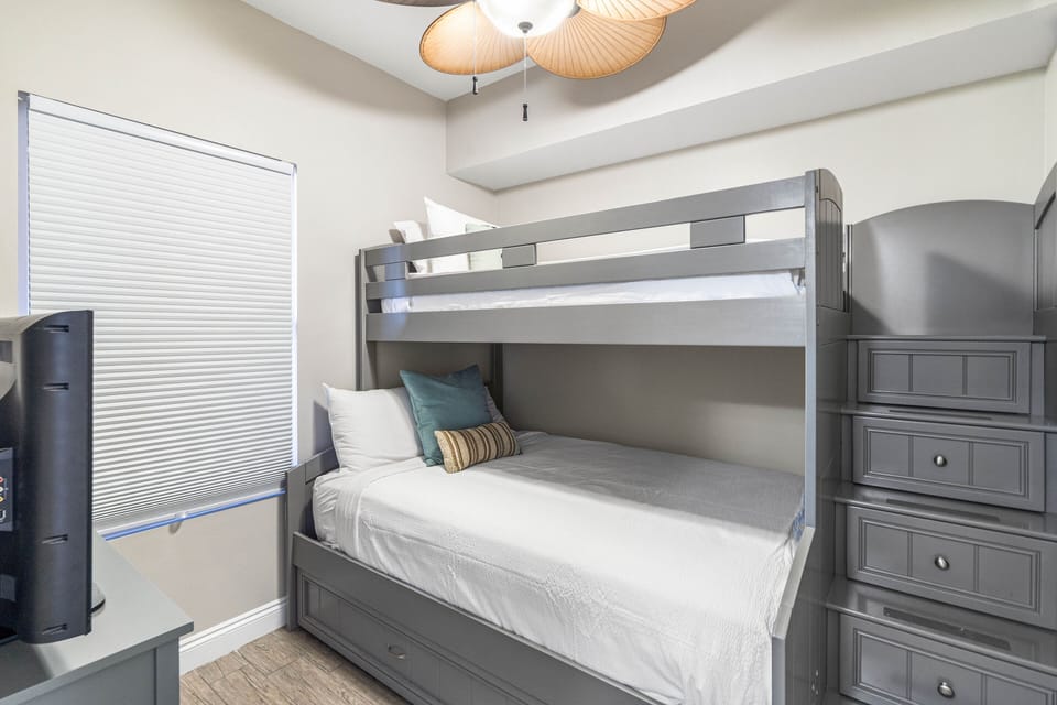 This condo has a bunk room which is a twin over double bed. Perfect for kids.