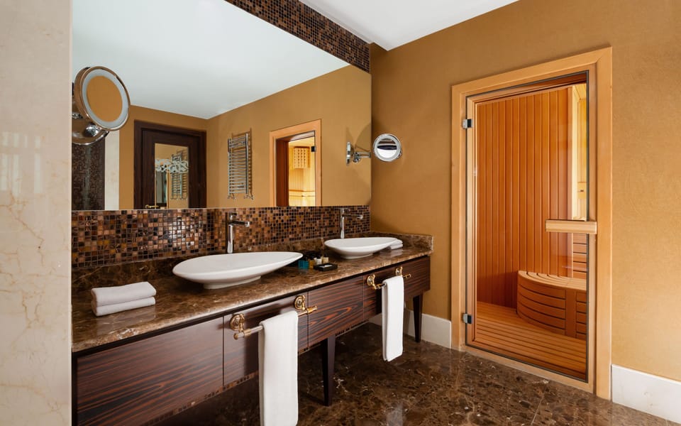 Presidential Suite, 2 Bedrooms (Free City Shuttle) | Bathroom | Free toiletries, hair dryer, bathrobes, slippers