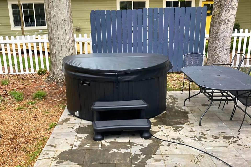 Newly added hot tub in the backyard