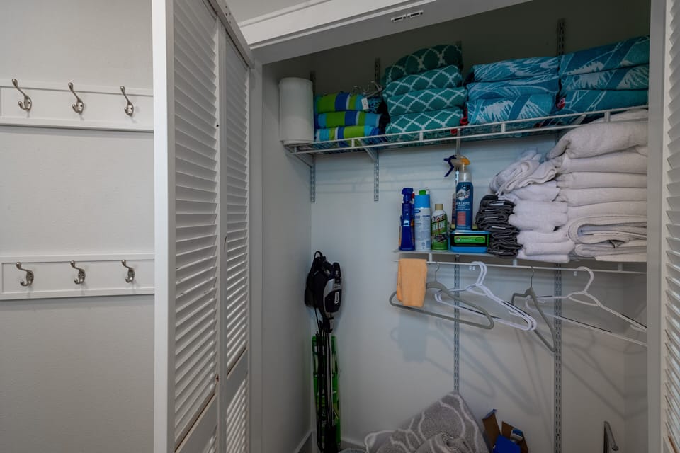 Additional closet in En Suite with Beach Towels and linens