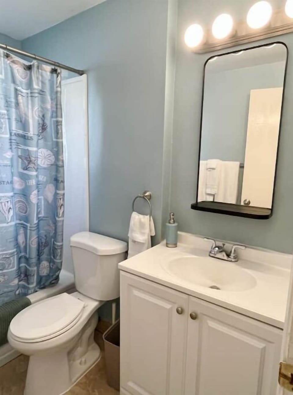 Freshen up in the full bathroom with a bathtub