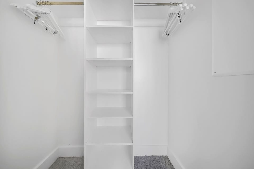 The spacious walk-in closet will accomodate all your belongings.