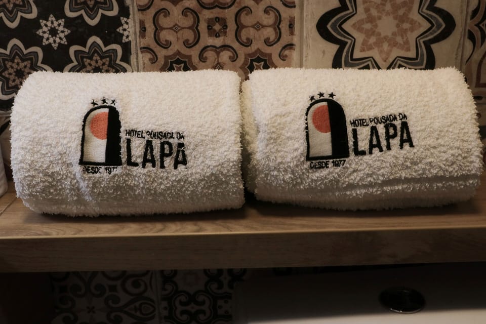 Shower, towels, soap, toilet paper