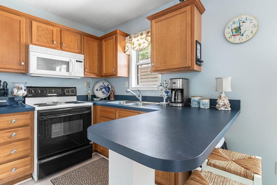 Cozy kitchen with ample counter space and natural light