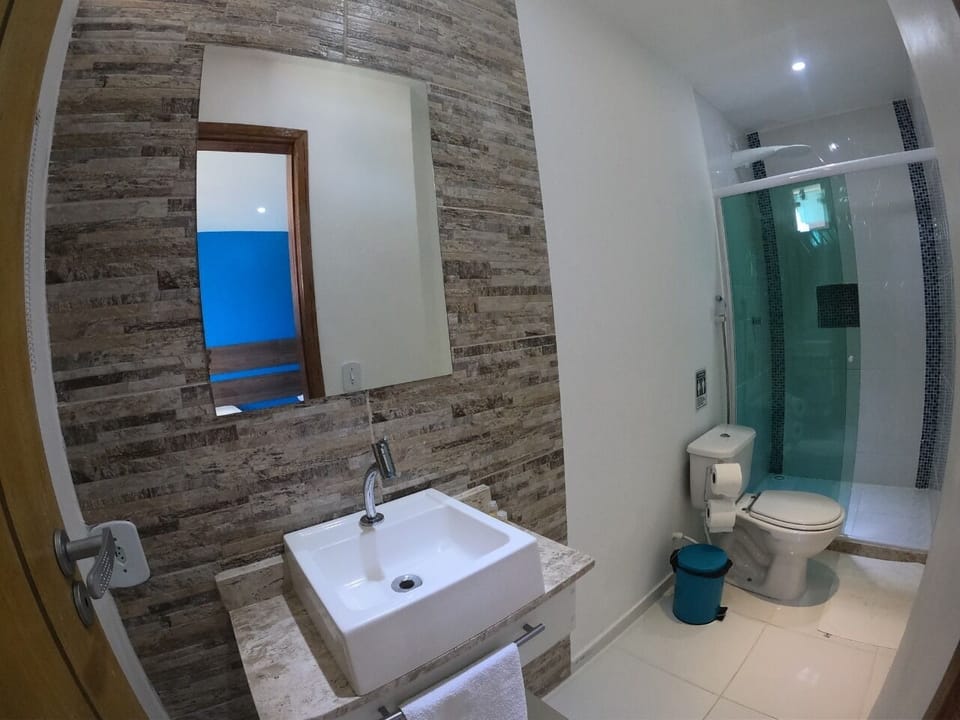 Shower, rainfall showerhead, towels, soap