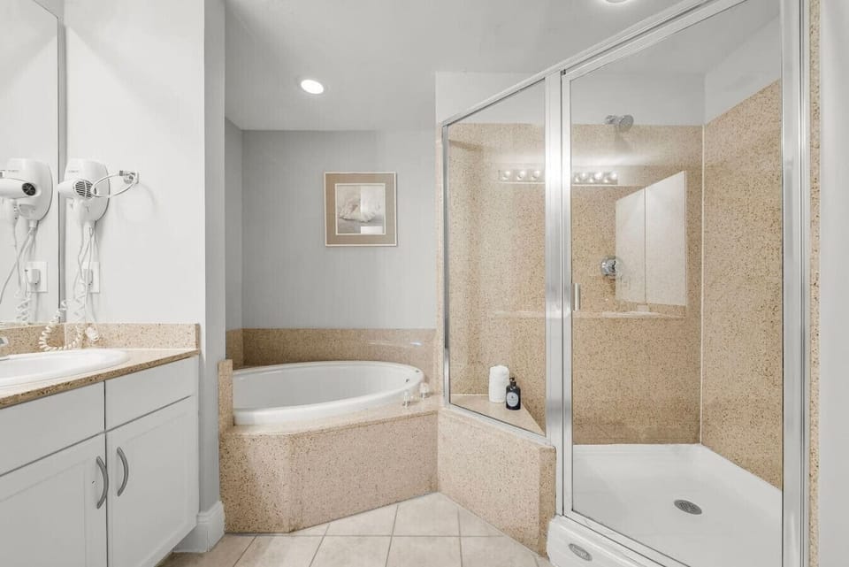 Primary Bathroom with Double Vanity, Garden Tub and Walk-In Shower