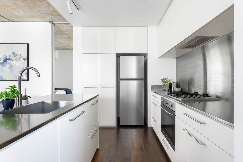 One Bedroom Apartment | Private kitchen | Full-size fridge, microwave, oven, dishwasher