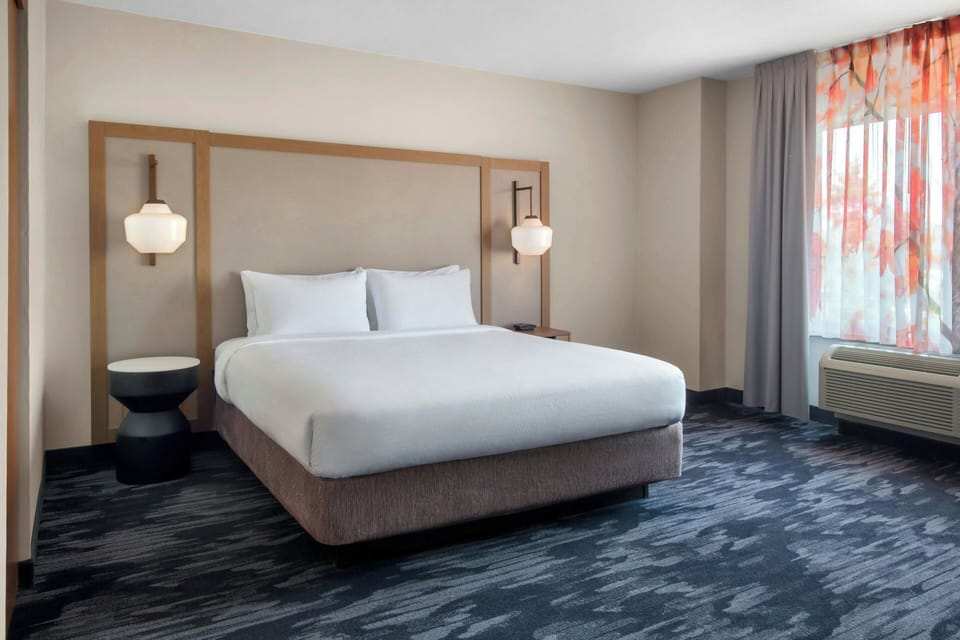 Premium bedding, desk, blackout drapes, iron/ironing board