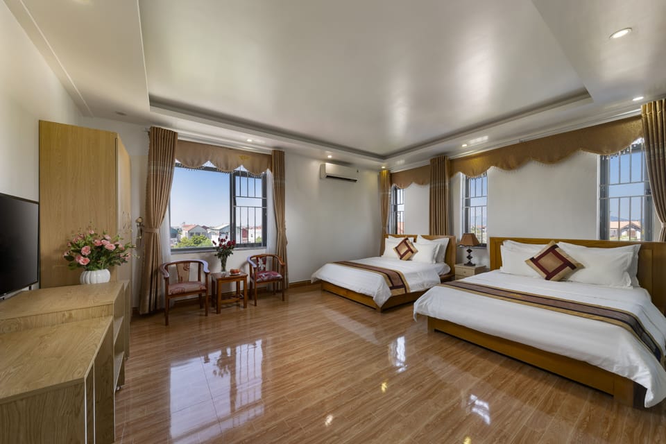 Deluxe Room, 2 Queen Beds | Minibar, in-room safe, desk, blackout drapes