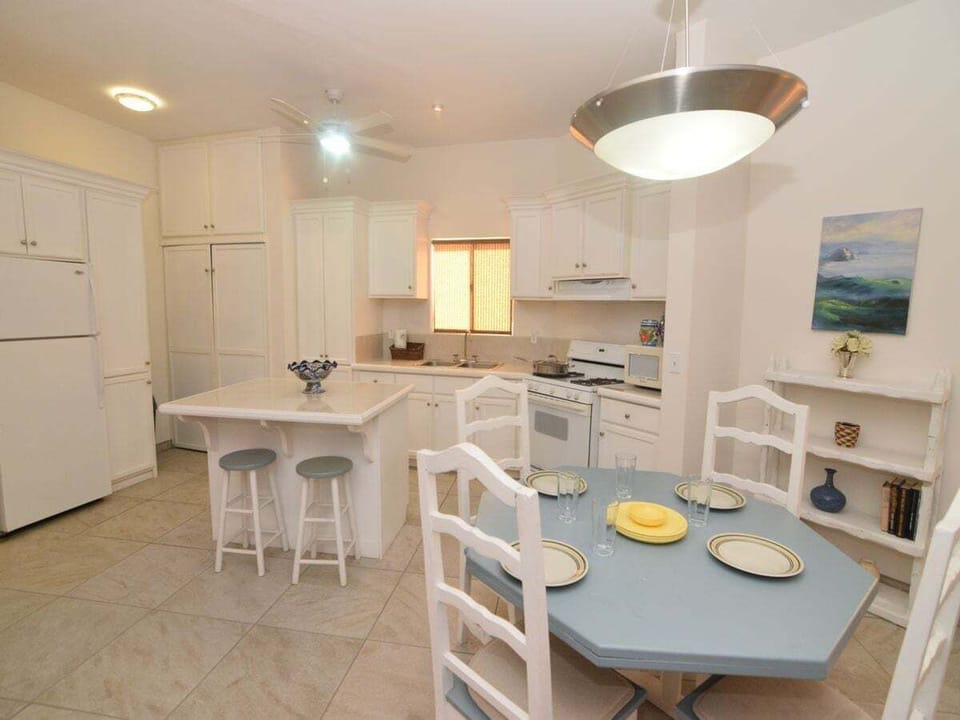 The cozy dining area extends from the kitchen and features a table with seating for four — perfect for casual family breakfasts or planning your day's adventures in San Felipe .