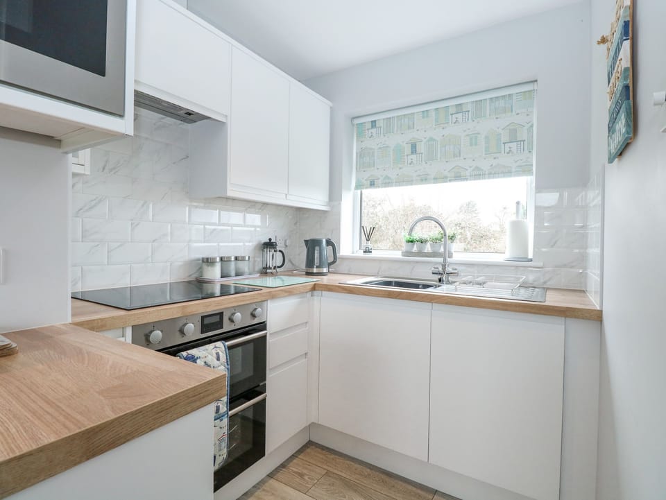 Fridge, electric kettle, toaster, cookware/dishes/utensils