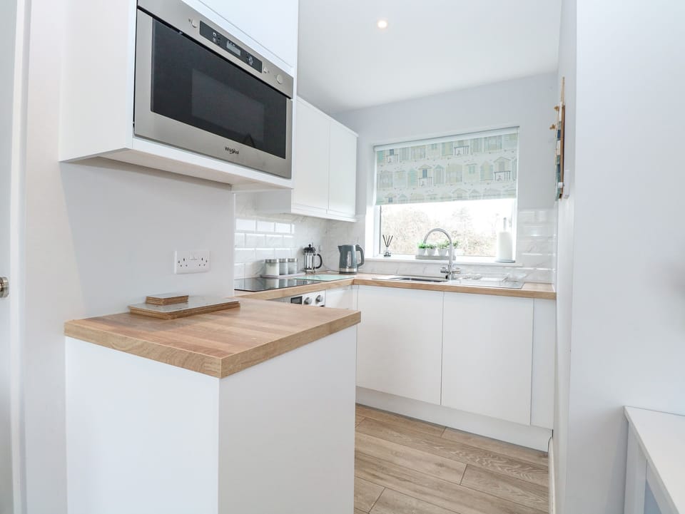 Fridge, electric kettle, toaster, cookware/dishes/utensils