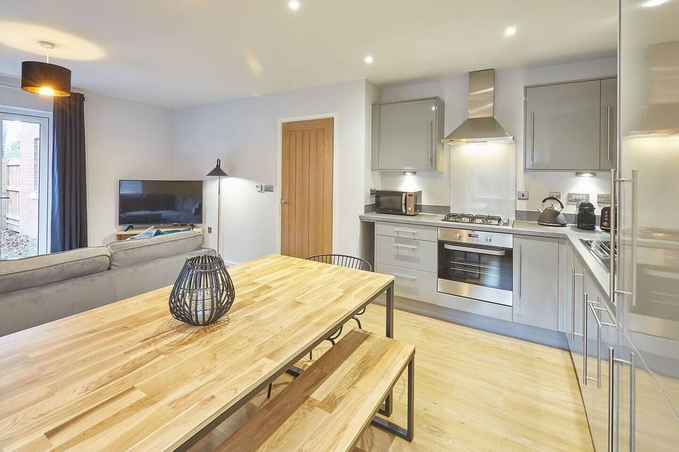 The fully equipped kitchen is perfect for whipping up a meal, with all the modern appliances and utensils you could need.