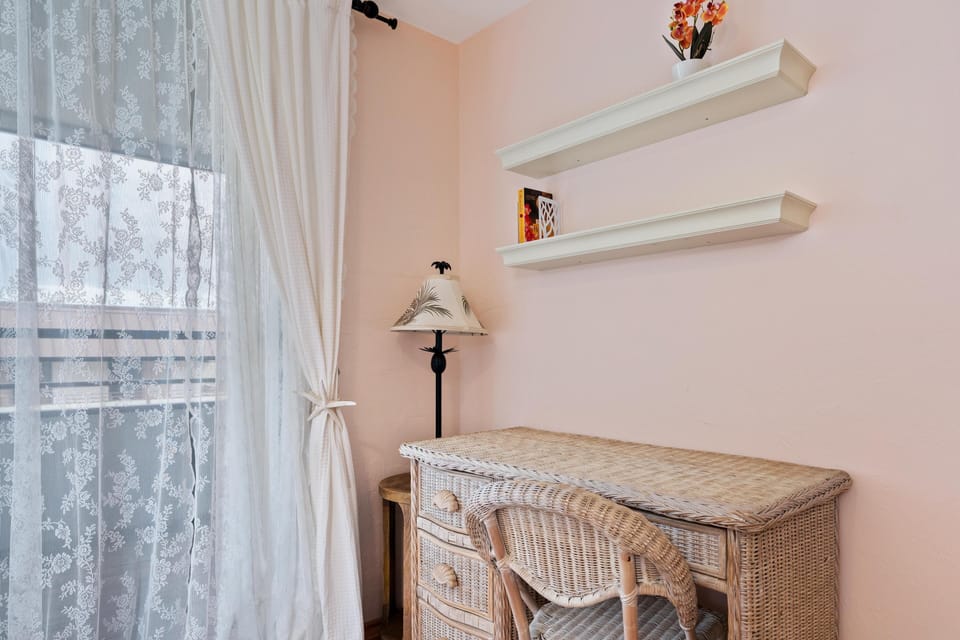 Utilize the desk in the primary bedroom to get some work done