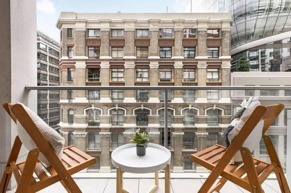 A private balcony with a setting.