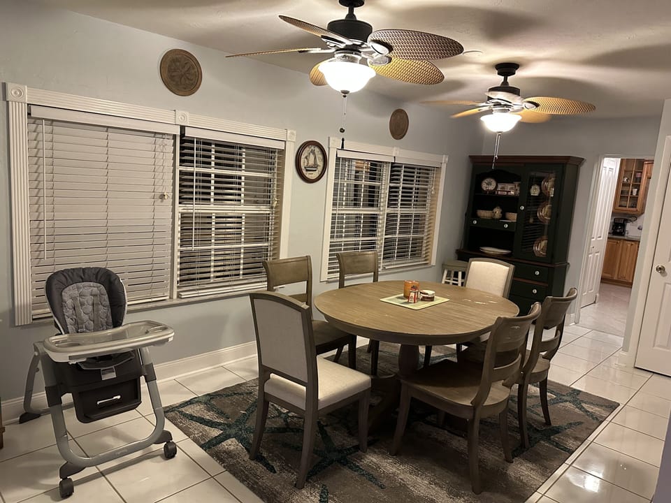 Dining area with six chairs. 