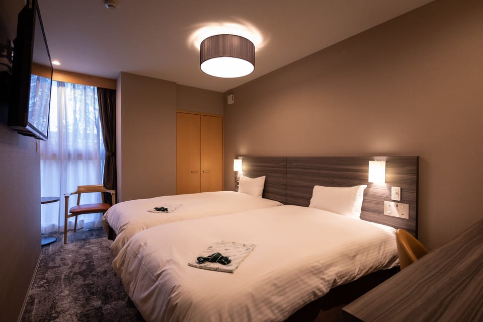 Premium Twin Room, Non Smoking, Annex Building | In-room safe, desk, iron/ironing board, free WiFi