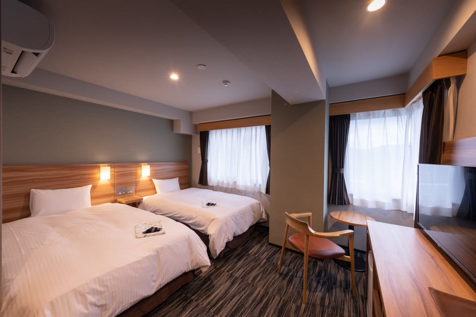 Deluxe Twin Room, Non Smoking, Annex Building | In-room safe, desk, iron/ironing board, free WiFi