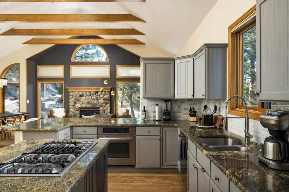Beautiful open floor plan with kitchen, living, and dining for the family to gather.