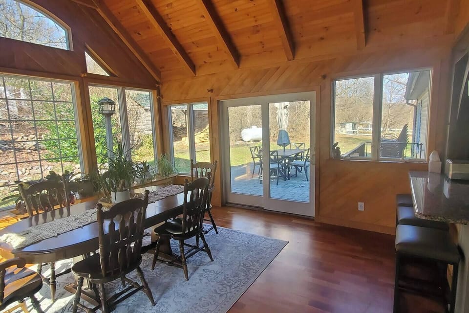 Dining room with doors leading out to patio.