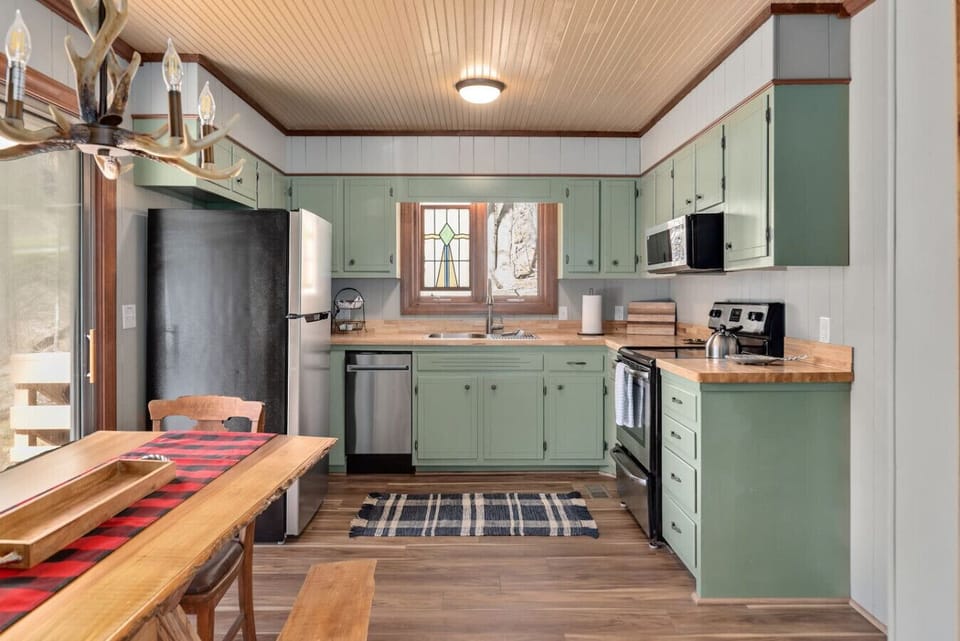 Fully equipped kitchen with stainless appliances