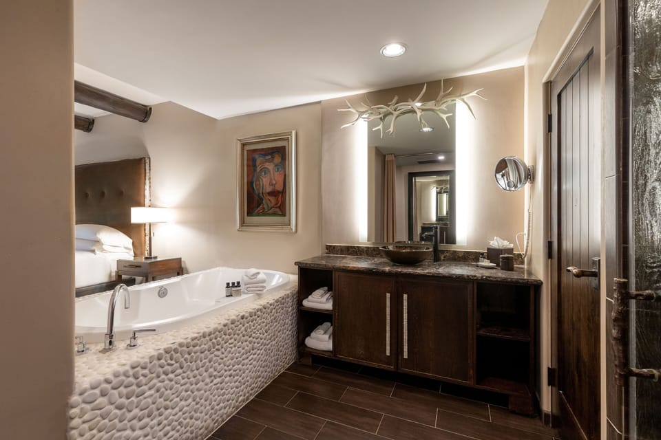 Designer toiletries, hair dryer, bathrobes, slippers