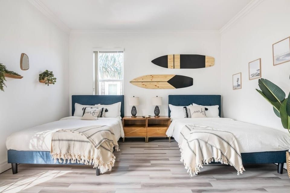 Twin full-sized beds with a Cali-coastal theme.  Perfect for a child's room