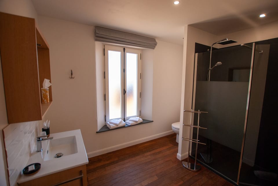 Double Room, 1 Queen Bed | Bathroom | Shower, hair dryer, slippers, towels