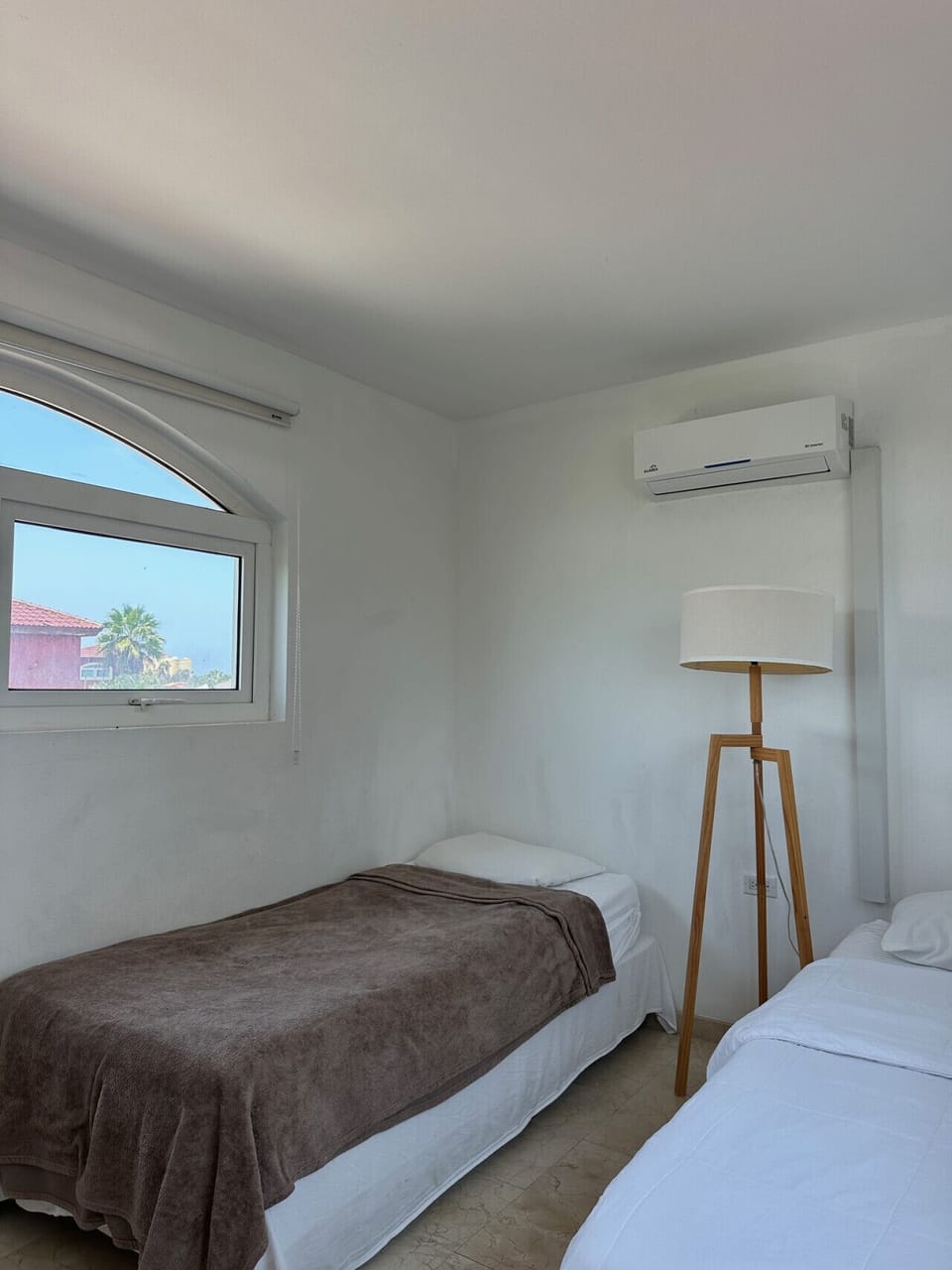 Tower loft room with 2 single beds above master bedroom