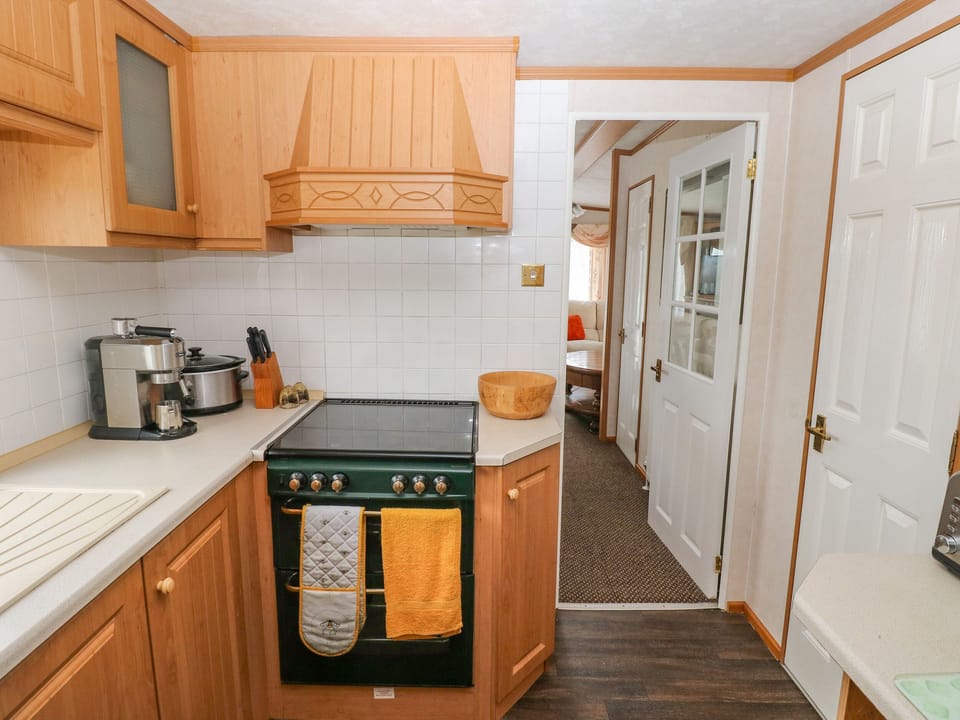 Fridge, electric kettle, toaster, cookware/dishes/utensils