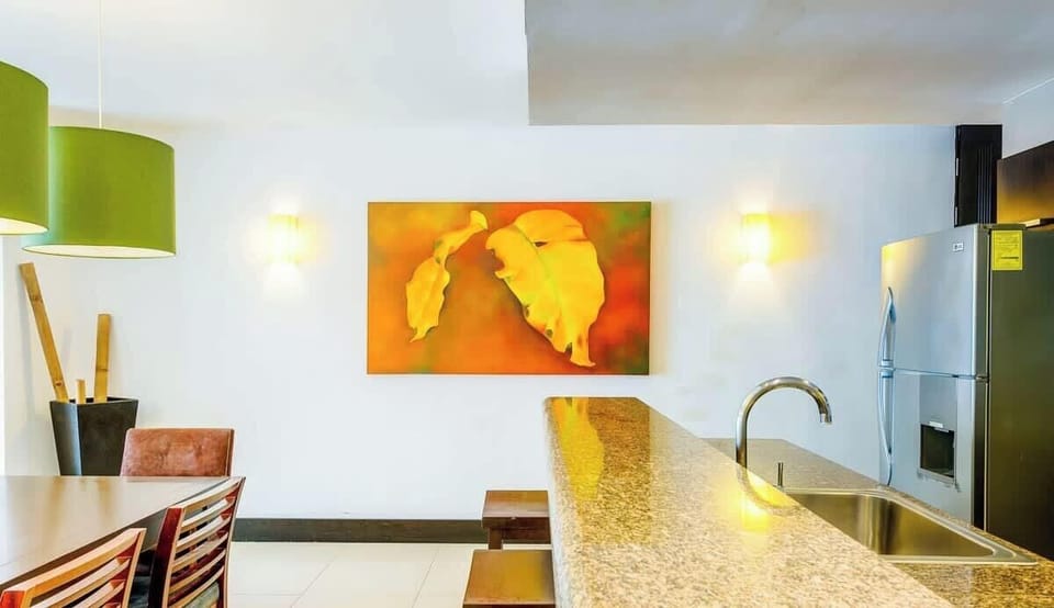 A fully-equipped kitchen & breakfast bar