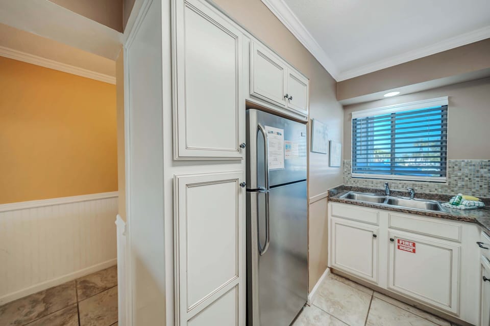 The fully equipped kitchen features stainless-steel appliances and has everything you need to prepare meals for family & friends.