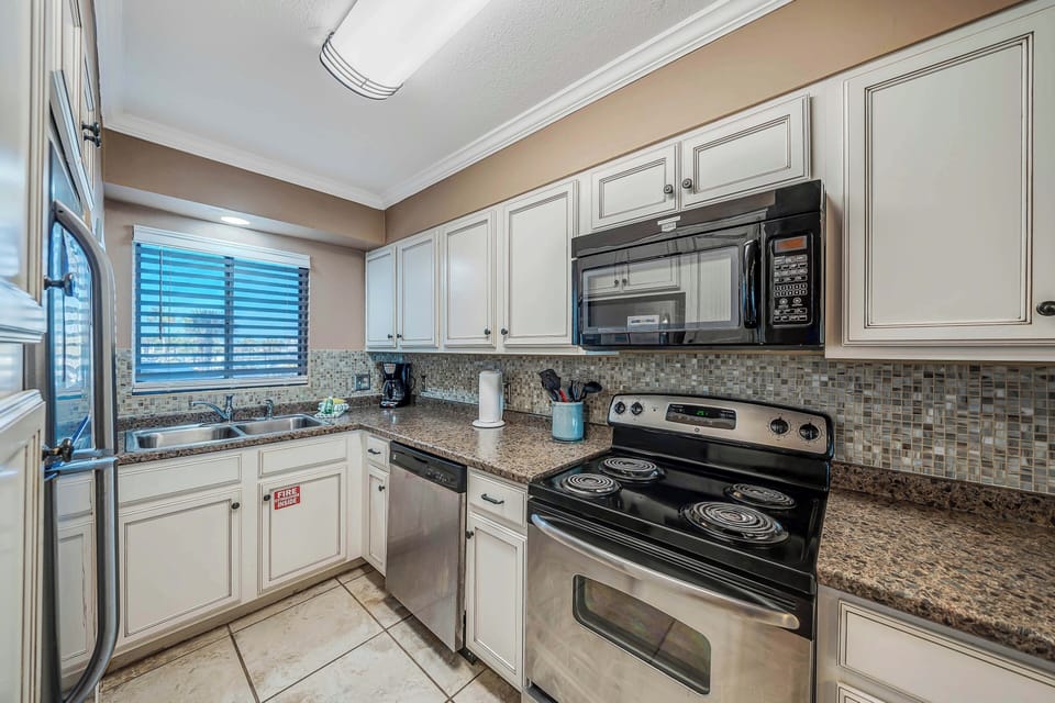 The fully equipped kitchen features stainless-steel appliances and has everything you need to prepare meals for family & friends.