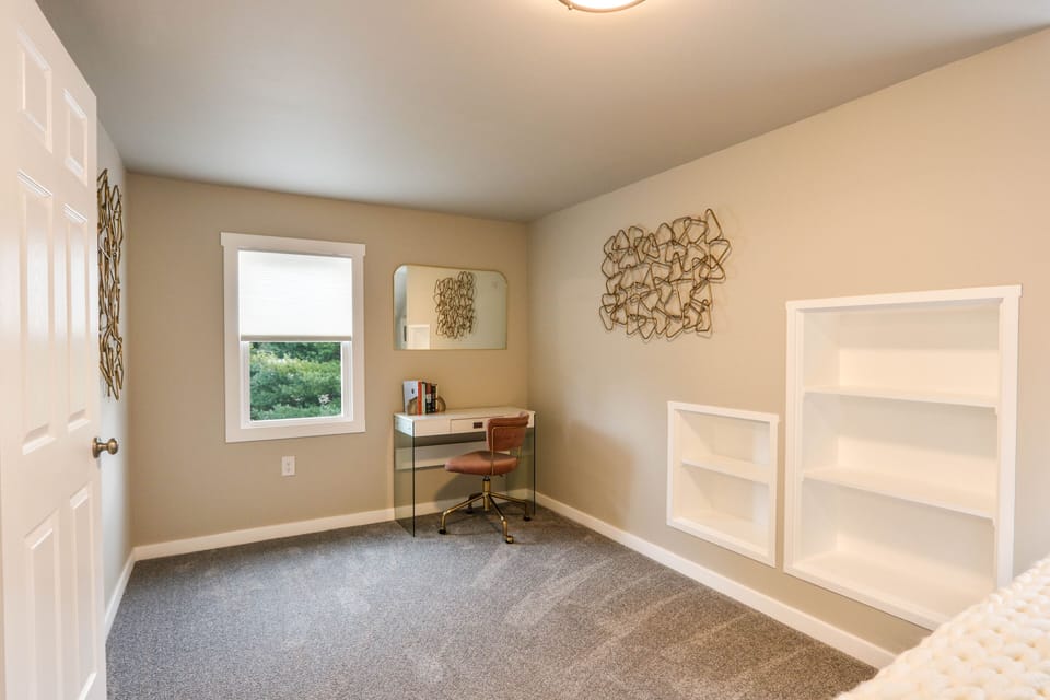 Upstairs bedroom with desk area