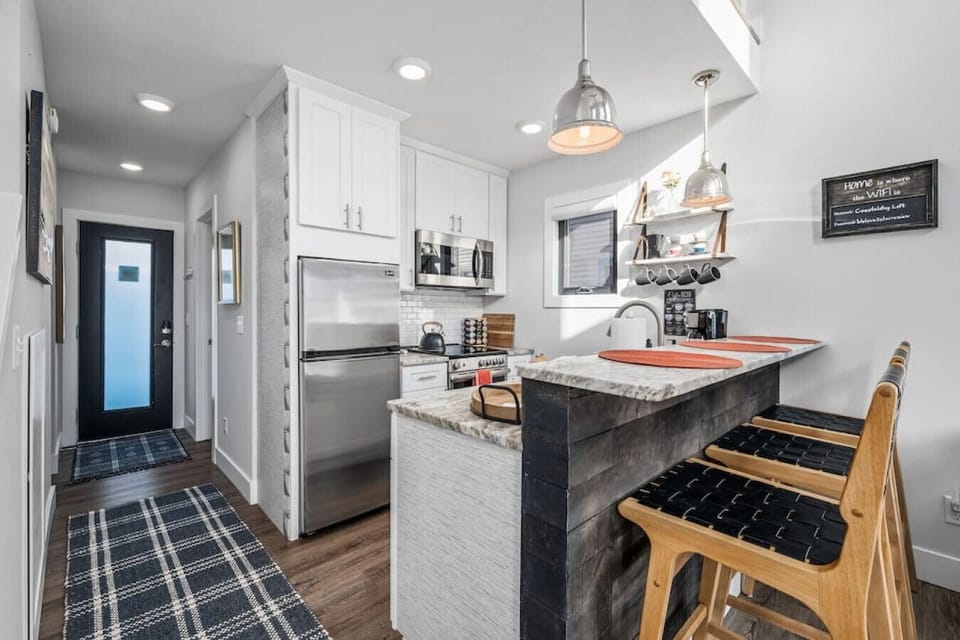 Spacious kitchen with a view of the hallway 🏠🍳