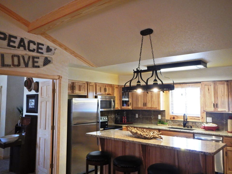 Indoors, Kitchen, Refrigerator, Cooktop, Microwave