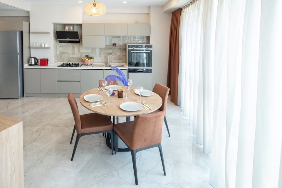 Exclusive Condo | Private kitchen | Full-size fridge, microwave (on request), oven, stovetop