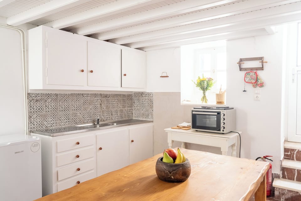Signature Apartment | Private kitchen | Mini-fridge, espresso maker, coffee/tea maker, electric kettle