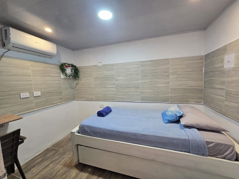 Economy Single Room, 1 Twin Bed, Air conditioning, Ground Floor | Free WiFi, bed sheets