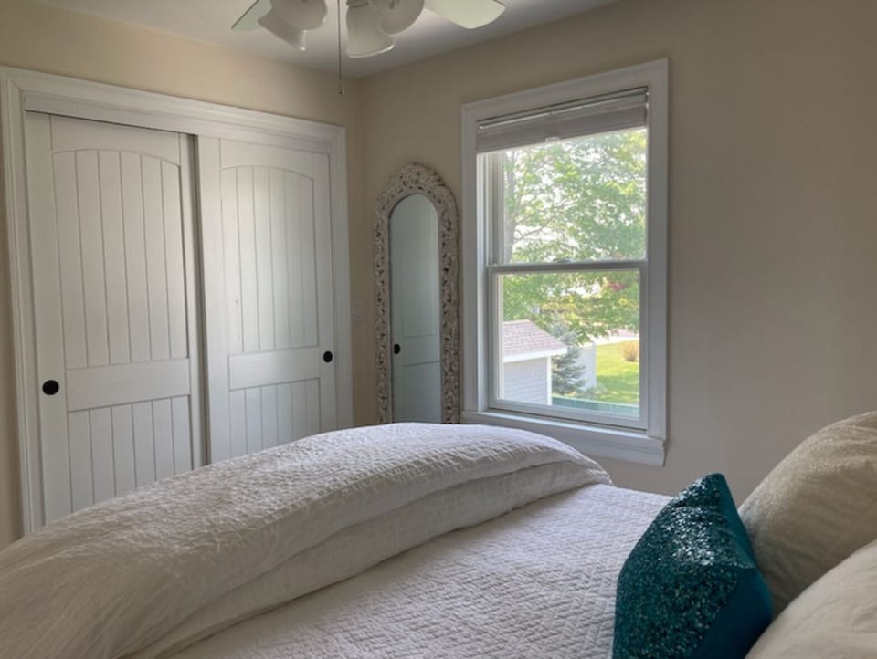 Bedroom 2, upstairs, with a queen size bed.