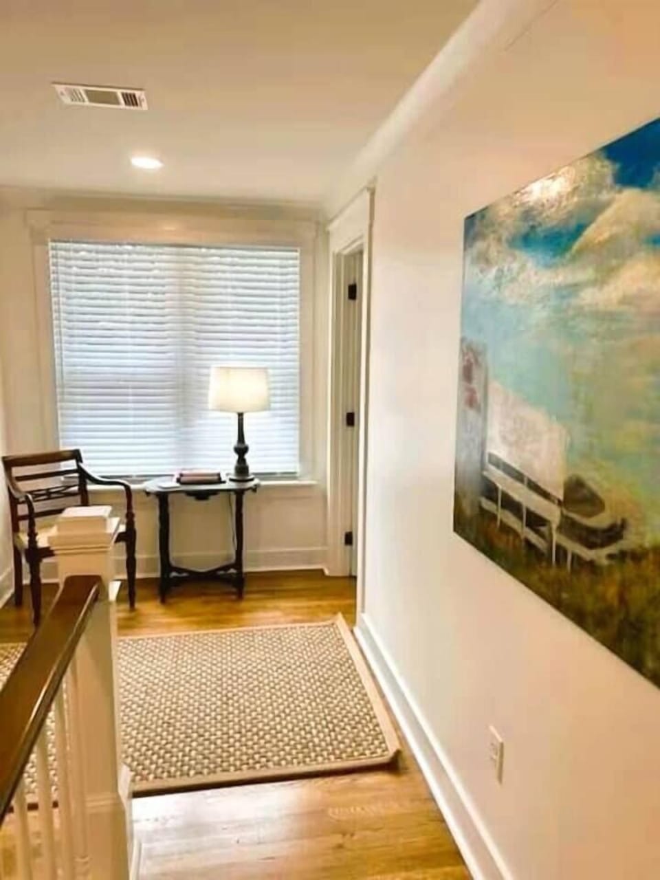 Showcasing gorgeous art in our upstairs hallway 