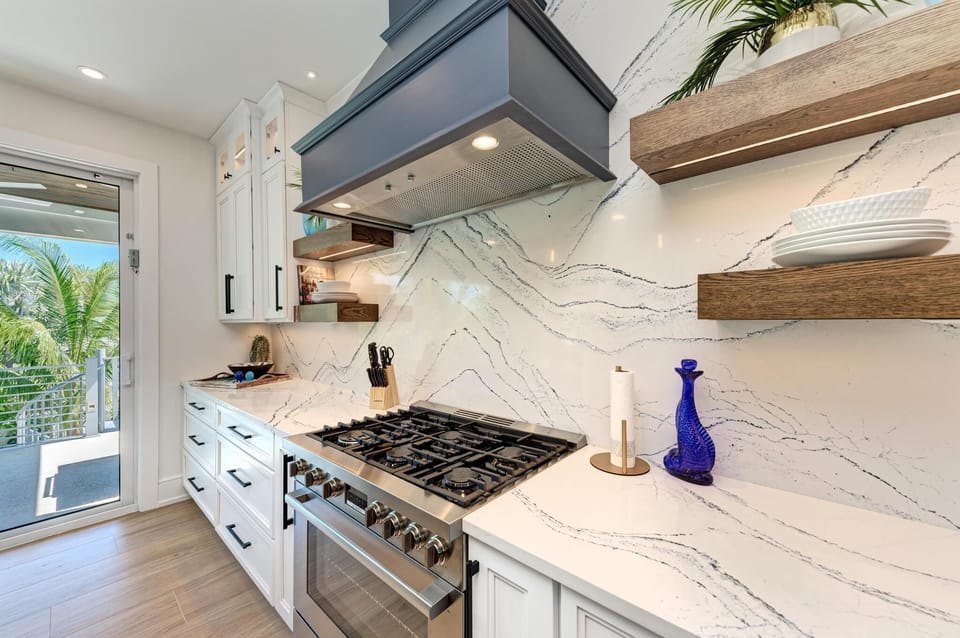 Custom kitchen has gas stove