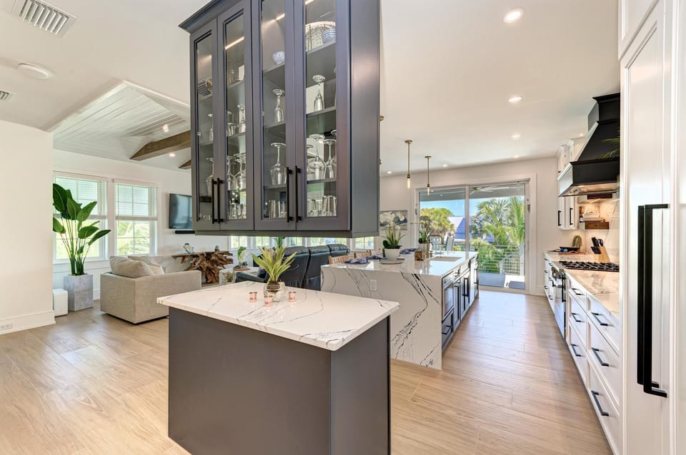 Floating wet bar has ice maker and beverage fridge