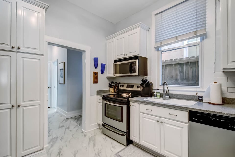 Downstairs is a full kitchen outfitted with the basic essentials.
