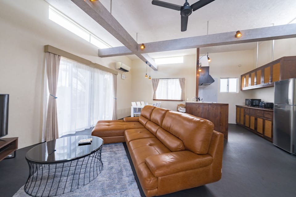 Villa | Living area | 59-inch flat-screen TV with digital channels, TV