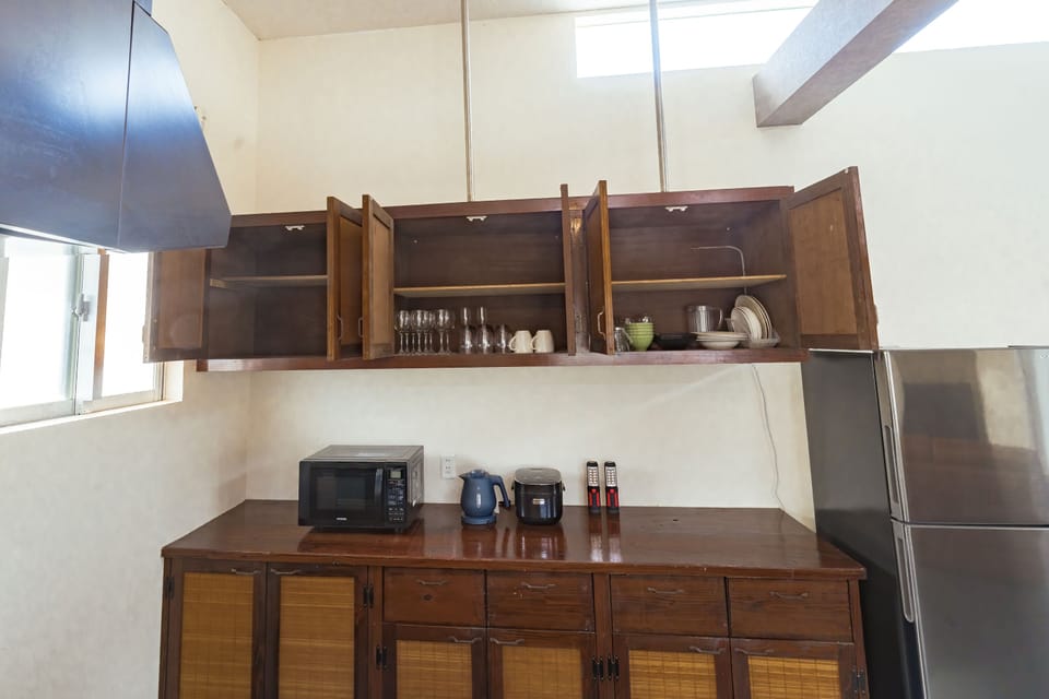 Villa | Private kitchen | Full-size fridge, microwave, electric kettle, rice cooker