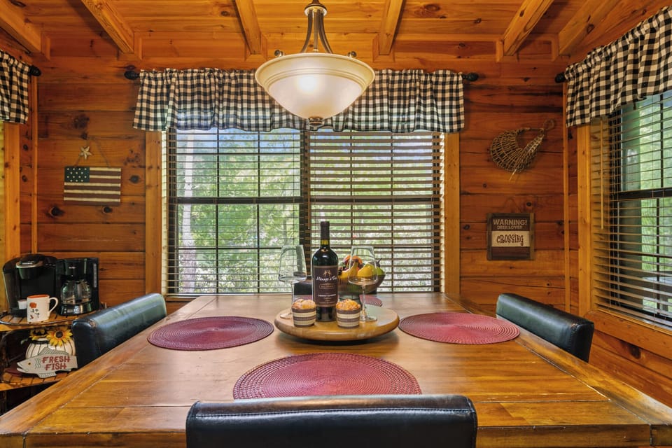 Enjoy your meals with a scenic backdrop at the dining table overlooking beautiful Cherry Lake